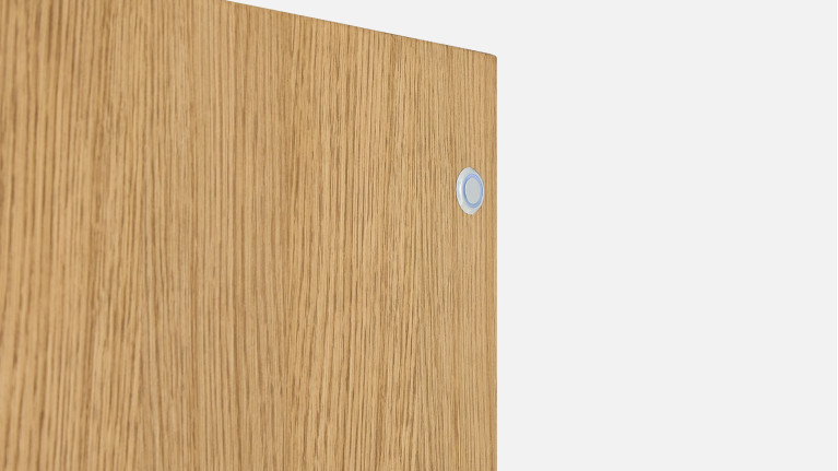 Chiffonnier ECLIPSE façades sculptées et piètement métal